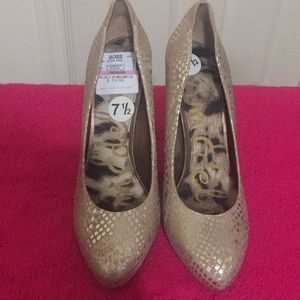 San Edelman gold snake print pumps.